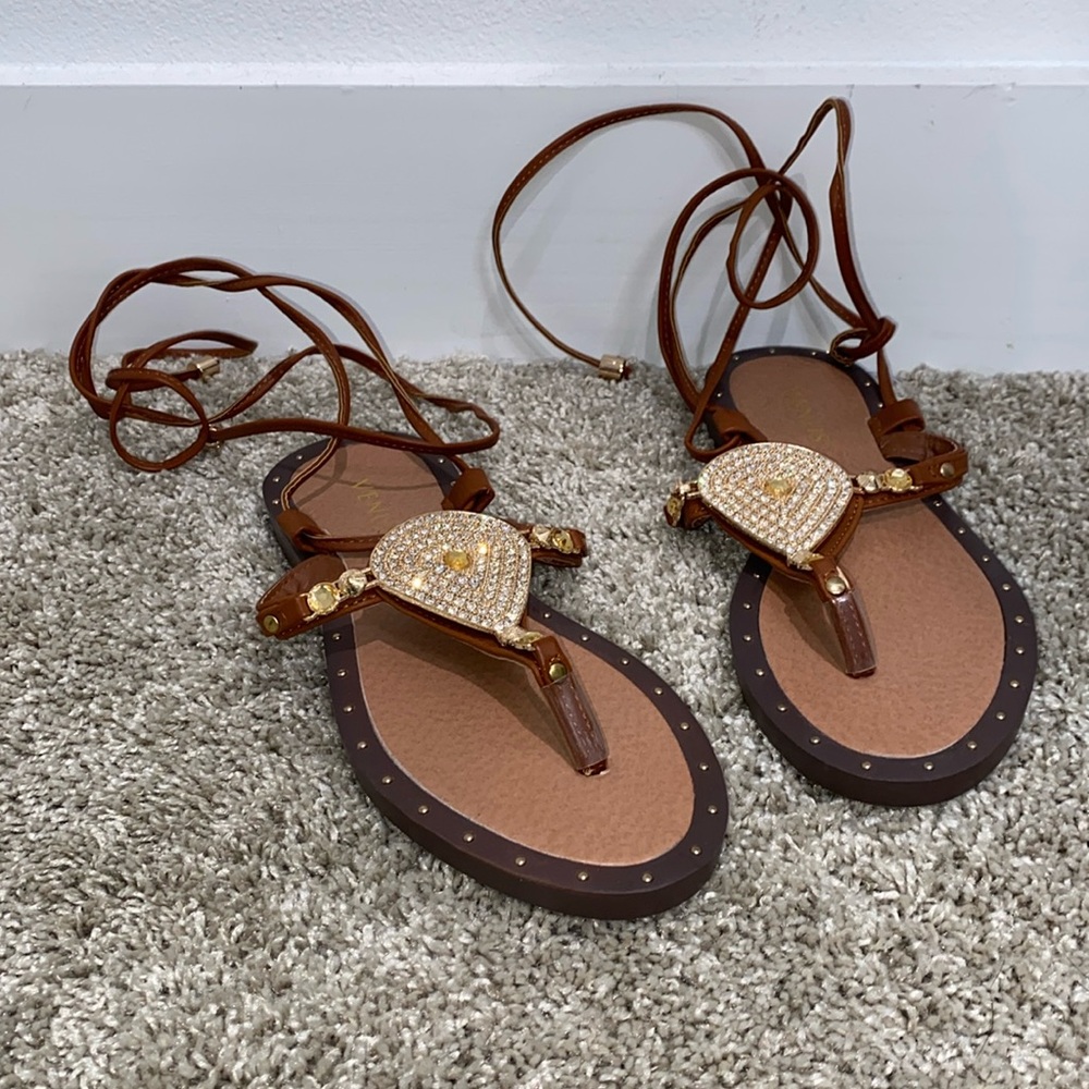 Flat thong style sandals with ankle straps by VENUS